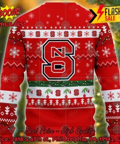 ncaa nc state wolfpack grinch hand christmas light ugly christmas sweater 2 n7OOB