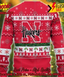 ncaa nebraska cornhuskers grinch hand christmas light ugly christmas sweater 2 K8gUt