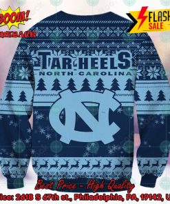 ncaa north carolina tar heels sneaky grinch ugly christmas sweater 2 Uz5BQ