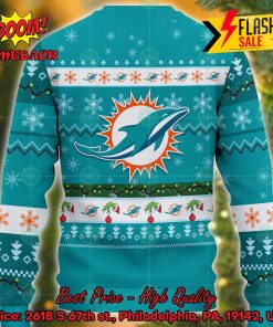 nfl miami dolphins grinch hand christmas light ugly christmas sweater 2 Rba0B