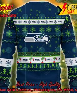 nfl seattle seahawks grinch hand christmas light ugly christmas sweater 2 9RTGb