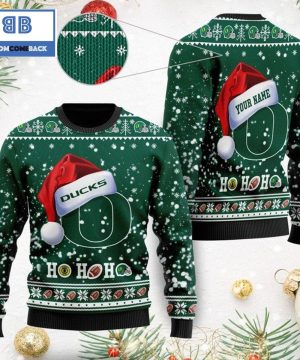 Oregon Ducks NCAA Santa Claus Hat Ho Ho Ho 3D Custom Name Ugly Christmas Sweater